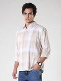 Men's casual beige checkered cotton shirt with full sleeves, relaxed fit – paired with denim jeans