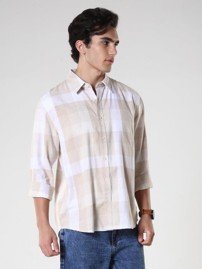 Men's casual beige checkered cotton shirt with full sleeves, relaxed fit – paired with denim jeans