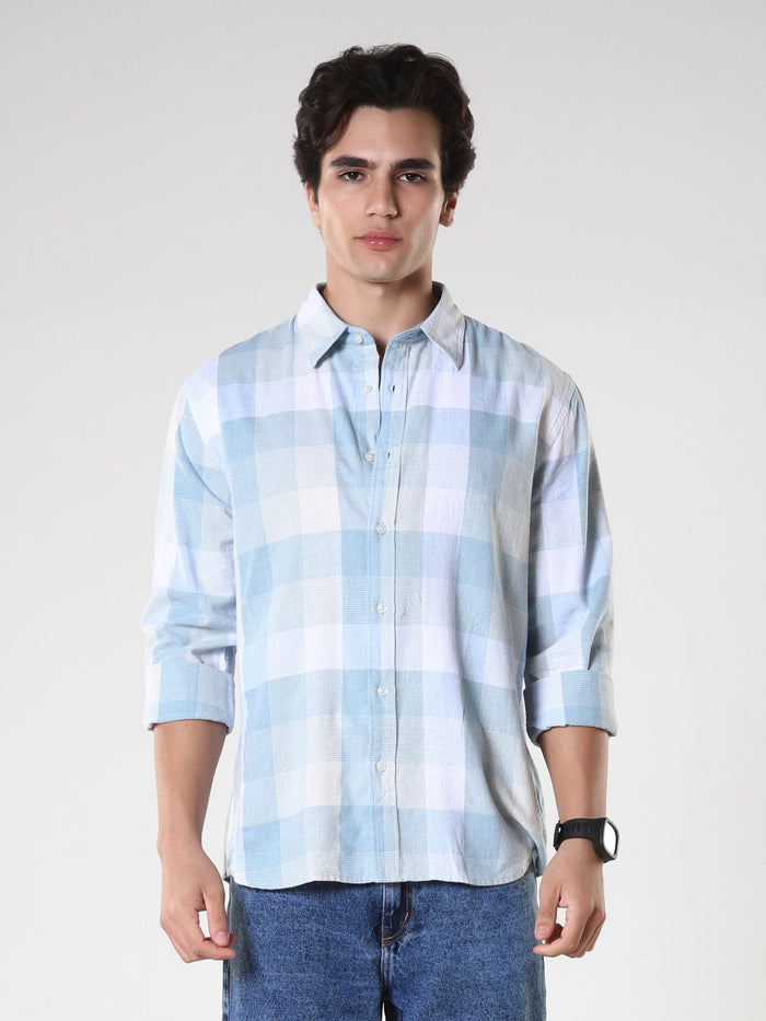 Men's casual sky blue checkered cotton shirt with full sleeves, relaxed fit – paired with denim jeans