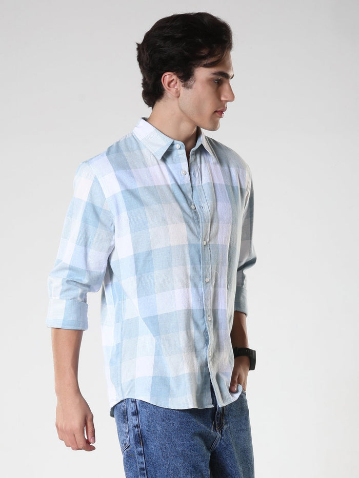 Men's casual sky blue checkered cotton shirt with full sleeves, relaxed fit – paired with denim jeans