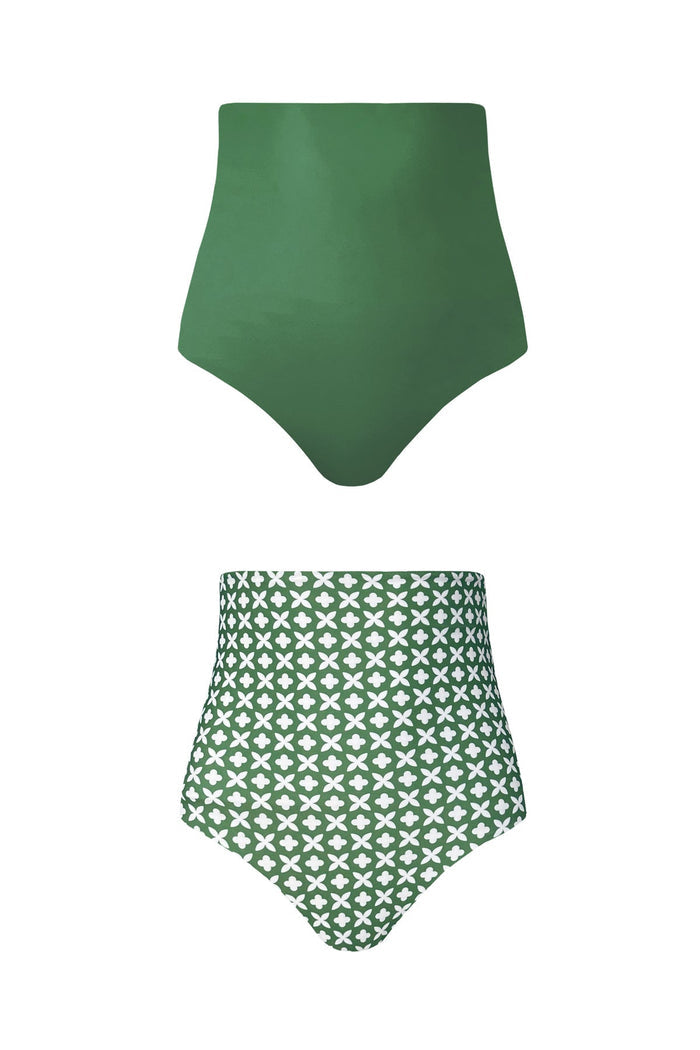 A product imaging showing each side of the reversible Eden bikini bottoms. One said shows the white, mosaic tile print while the other features a solid juniper green colour.