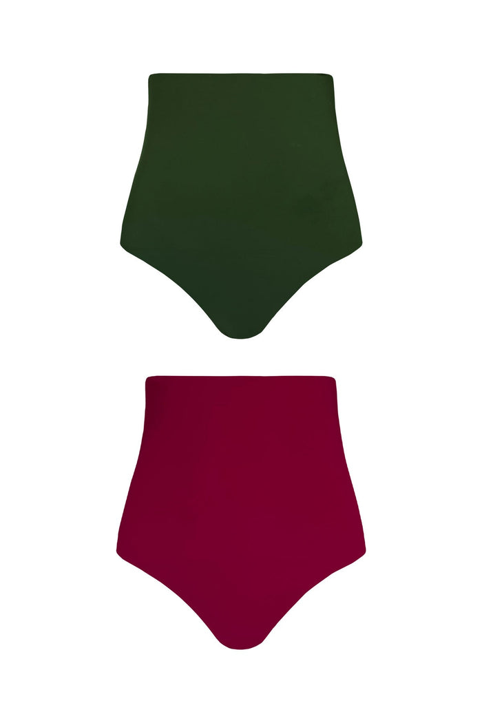 A product image showing each reversible side of the Gaia bikini bottoms. One pair of bottoms shows the raspberry pink side, whilst the other features a complimentary deep green colour.
