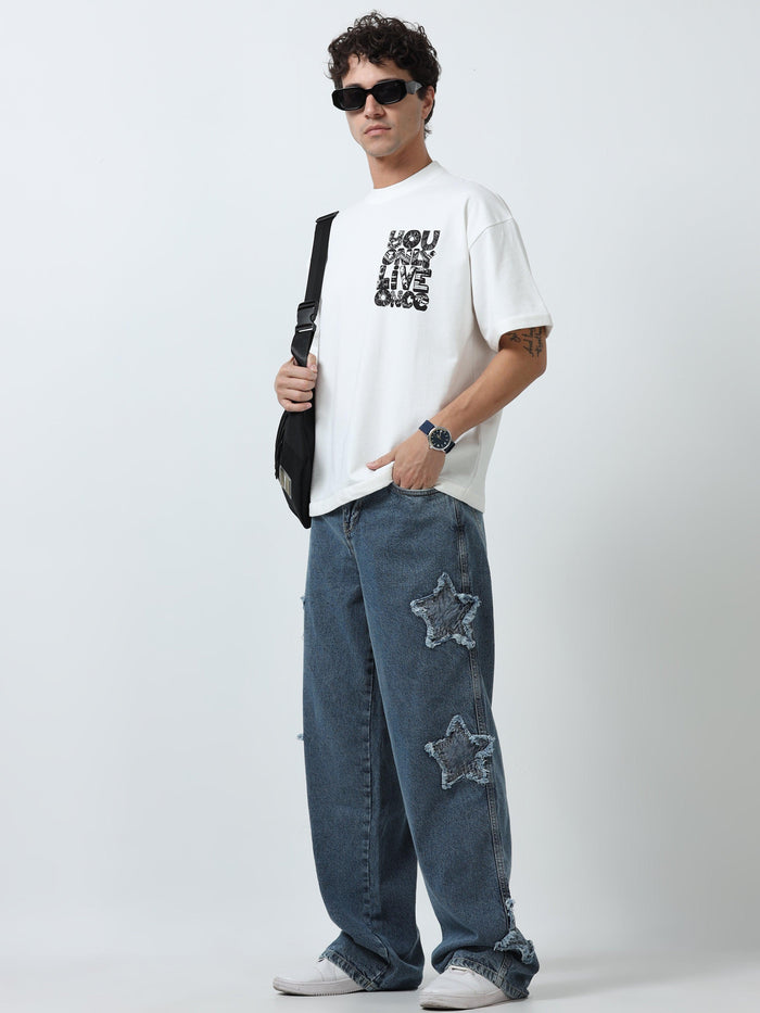 Loose fit washed  jeans with star patch offering a unique look
Loose fit jeans for men
stylish jean for men