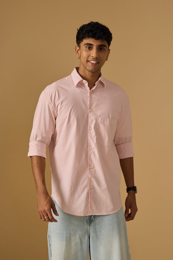 men's oversized pink stripped shirt with full sleeve and chest pocket made from 100% cotton.
pure cotton shirts for men
oversized shirts for men