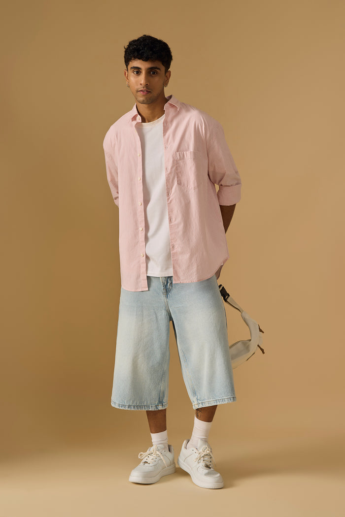 men's oversized pink stripped shirt with full sleeve and chest pocket made from 100% cotton.
pure cotton shirts for men
oversized shirts for men