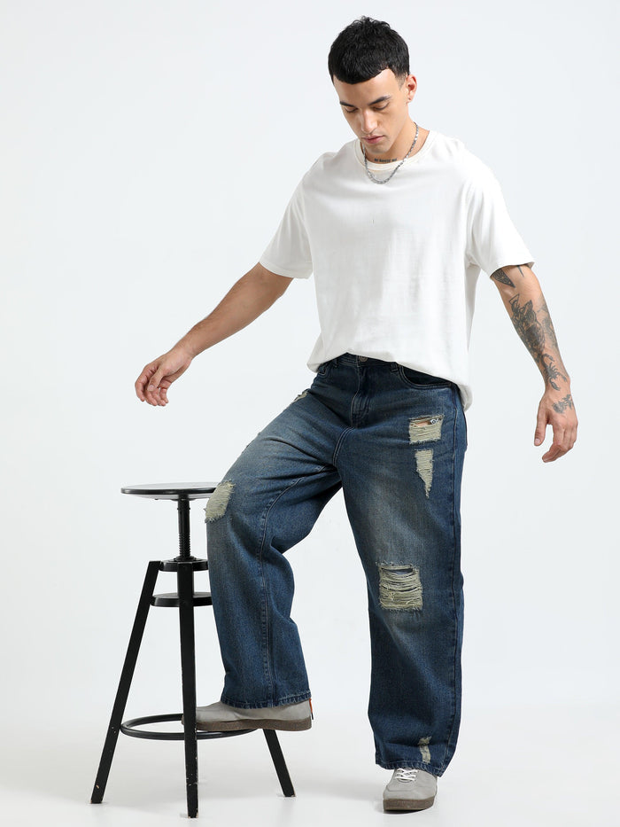 loose fit jean with patches and distress
Loose fit pants for men
patched pants or men