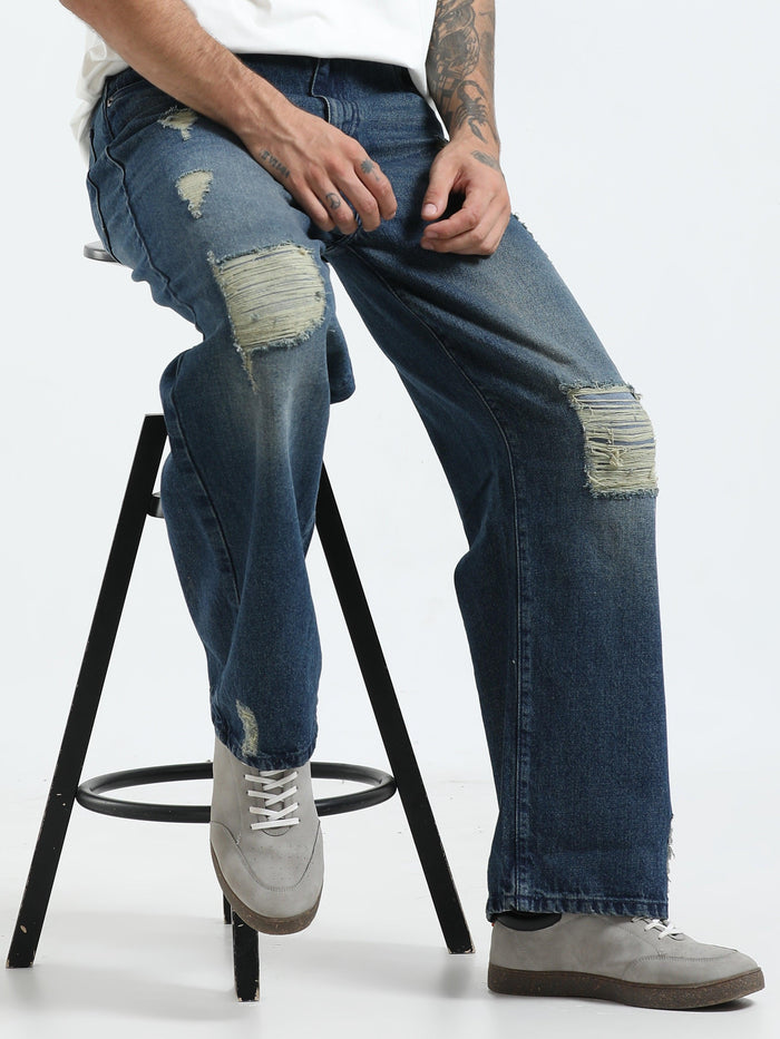 loose fit jean with patches and distress
Loose fit pants for men
patched pants or men