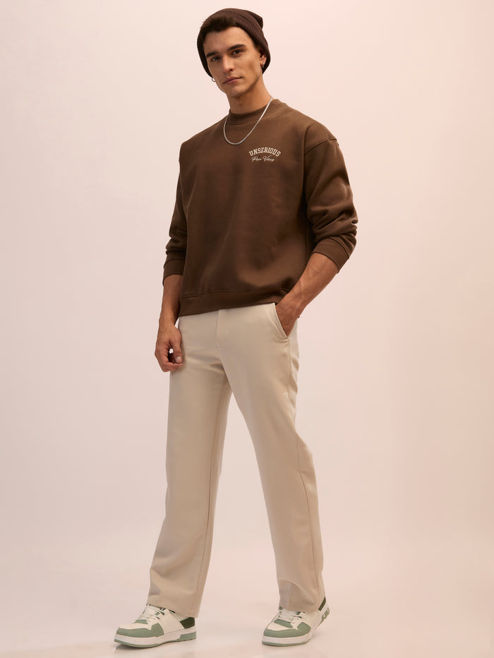Men's choclate brown full sleeve fleece sweater tee with front chest print and soft winterwear.