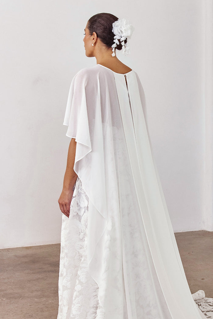 Floral Bridal Headpiece paired with wedding cape and wedding dress