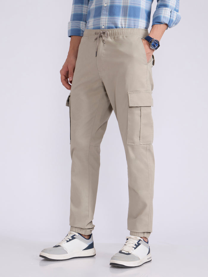 Men's jogger pant in beige with elasticated drawstring