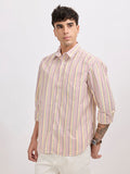 Man wearing a peach cotton oversized striped shirt with rolled sleeves, front pocket, and button-down collar
100% cotton